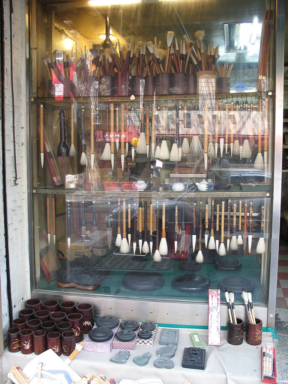Traditional Korean calligraphy shop — where brush strokes, like birth charts, carry meaning in every detail