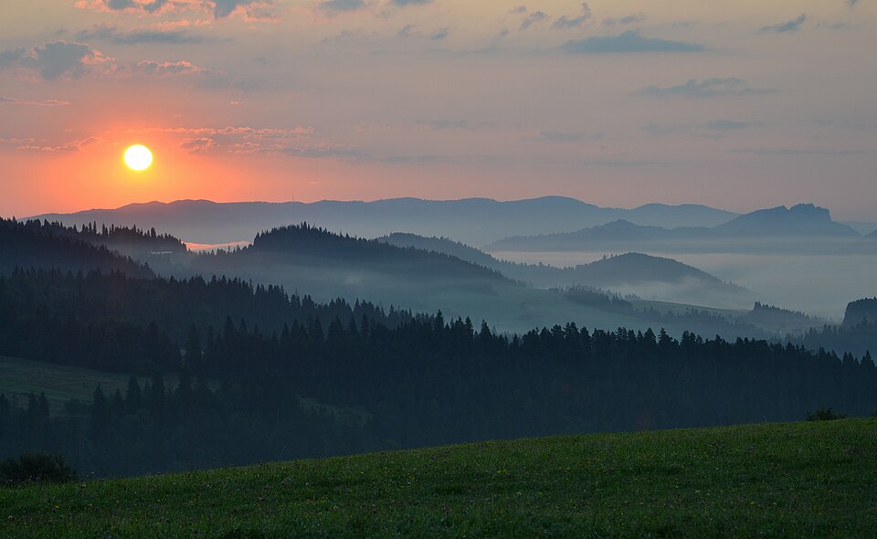 Sunrise over mountains — the moment the mountain reveals its full shape to the world